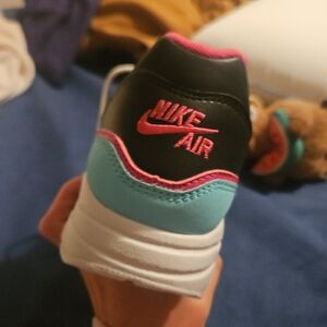 Nike Air Black and Blue Sneakers with Pink Logo